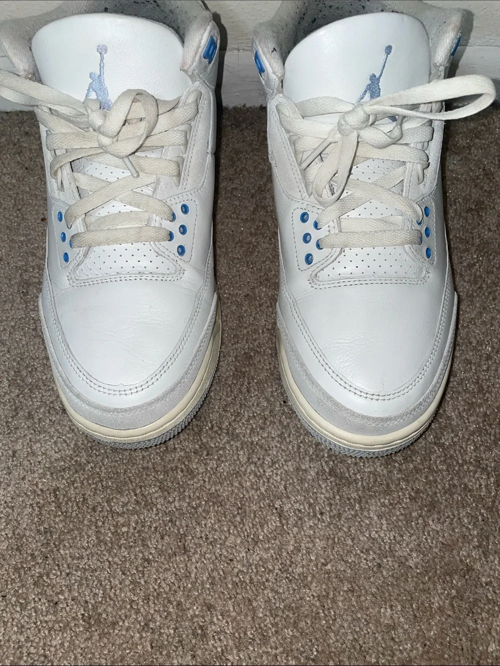 Jordan White Sneakers with Light Blue Accents